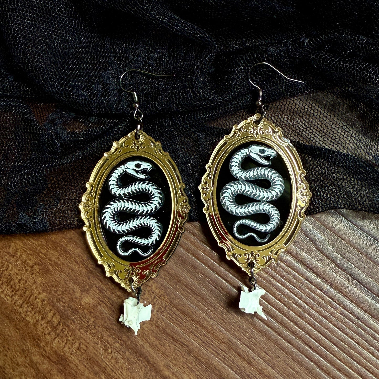 Framed Snake Skeleton Dangles