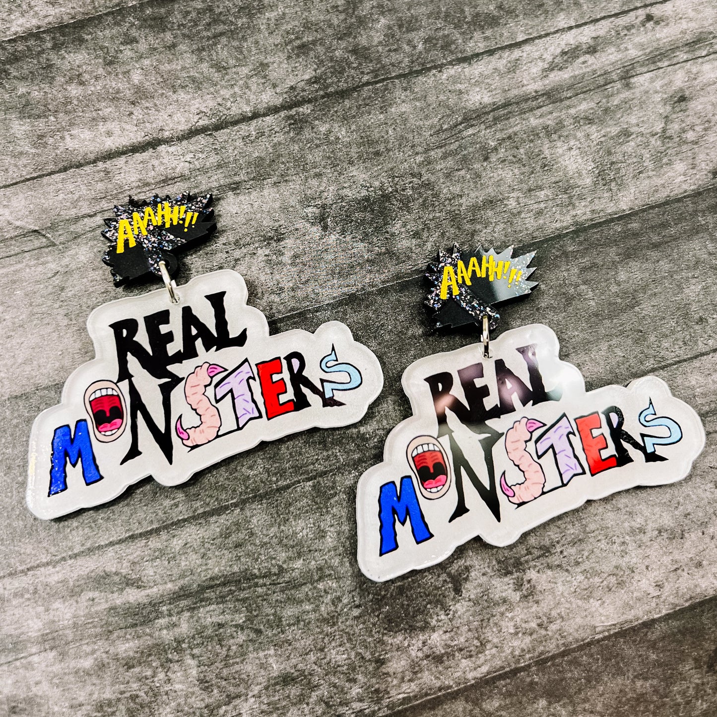 AUG CLEARANCE Ah Real Monsters Logo Earrings