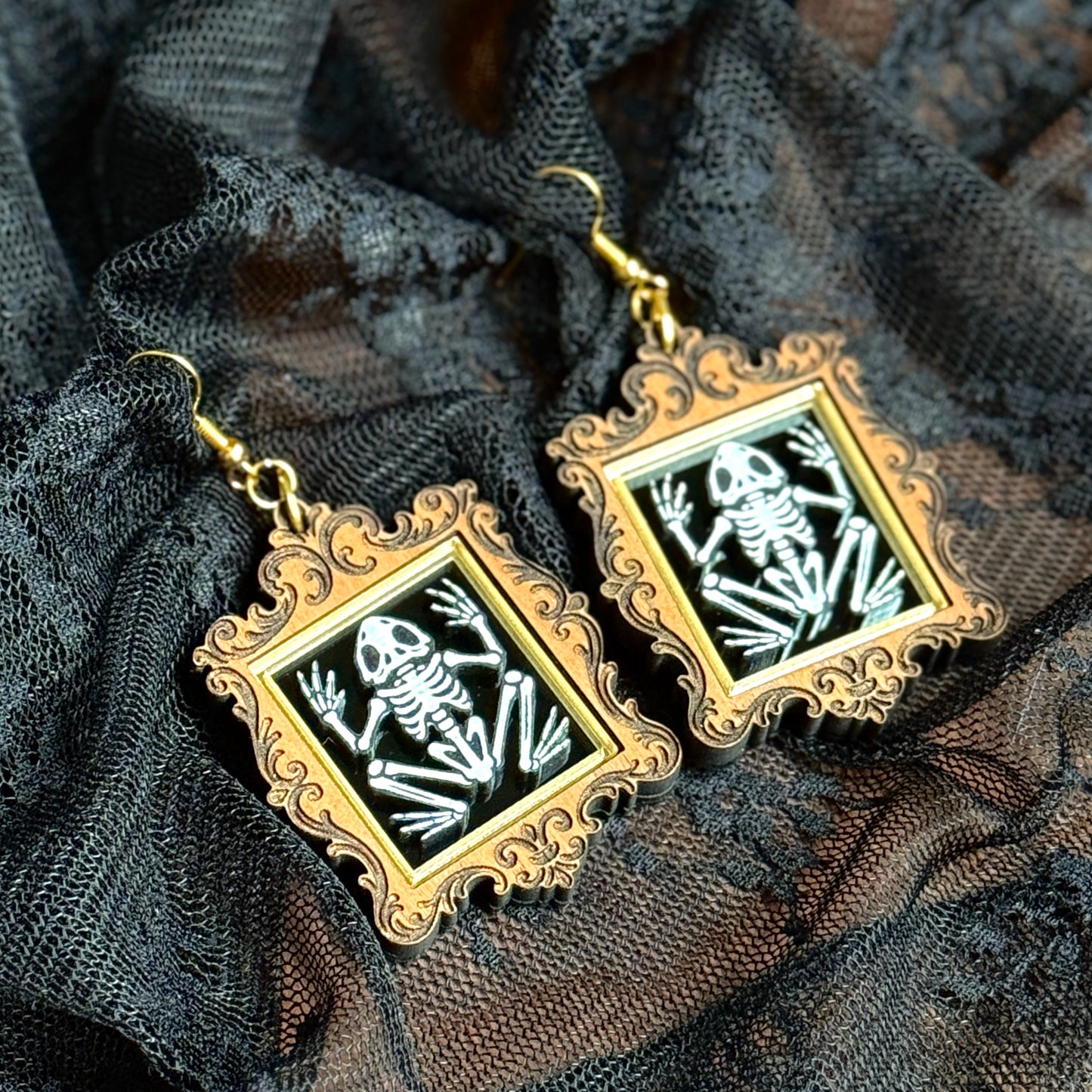 Framed Frog Skeleton Dangles