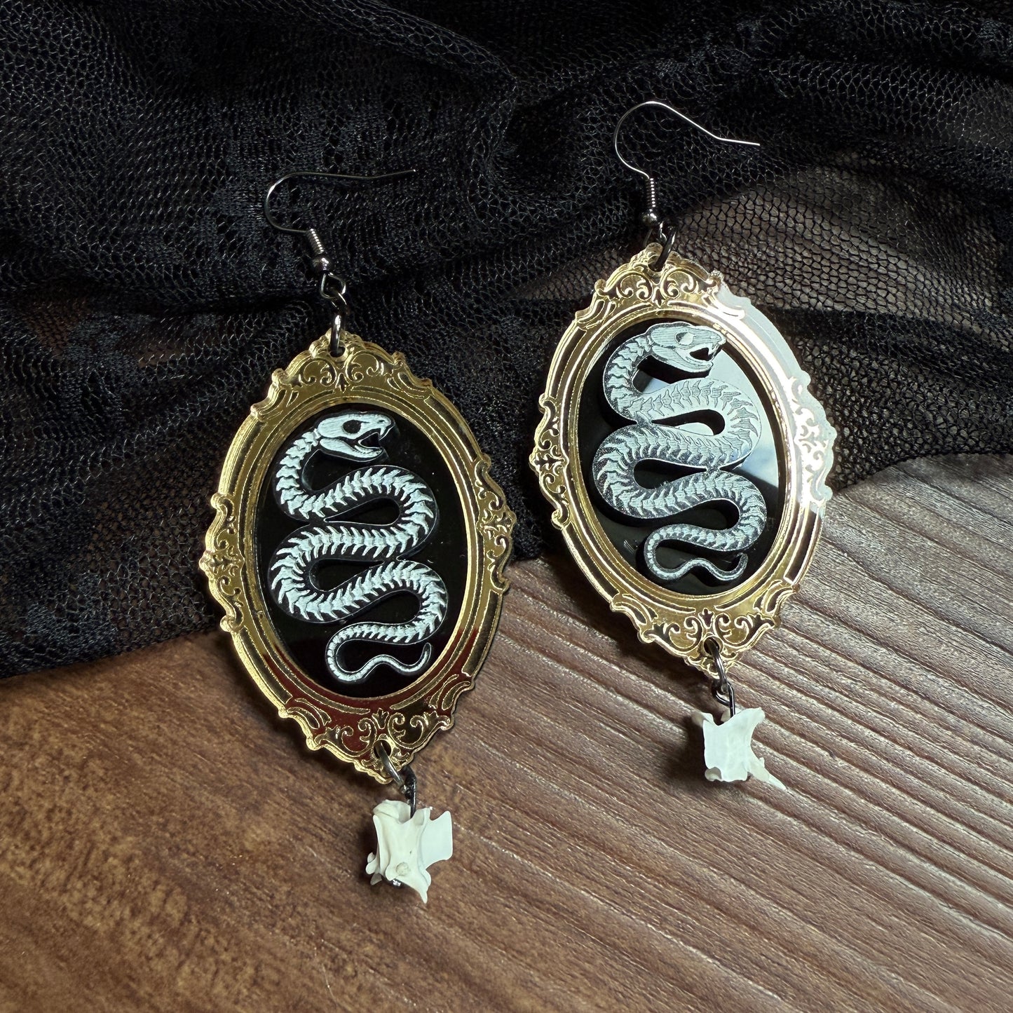 Framed Snake Skeleton Dangles