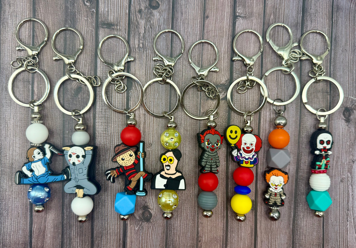 Spooky Circus Beaded Keychains Featuring Dancing and Clown Characters