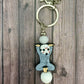 Spooky Circus Beaded Keychains Featuring Dancing and Clown Characters