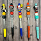 Spooky Circus Beaded Glitter Pens Featuring Dancing and Clown Characters