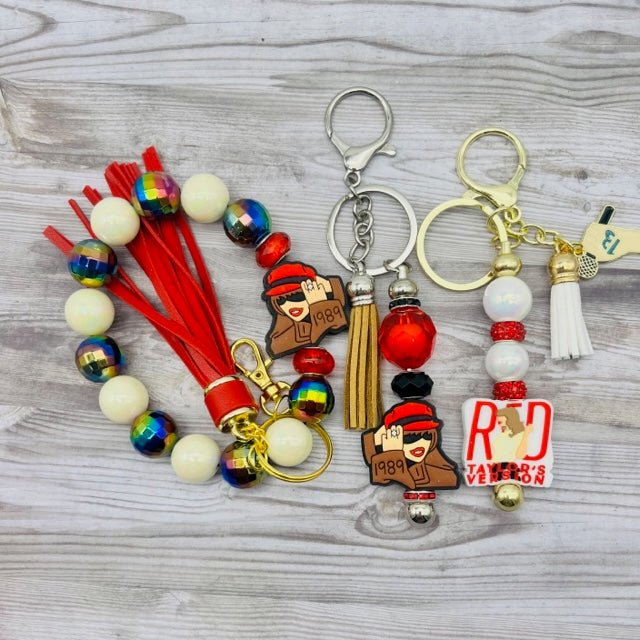 TAYLOR SWIFT Pens, Keychains and Wristlet Keychains