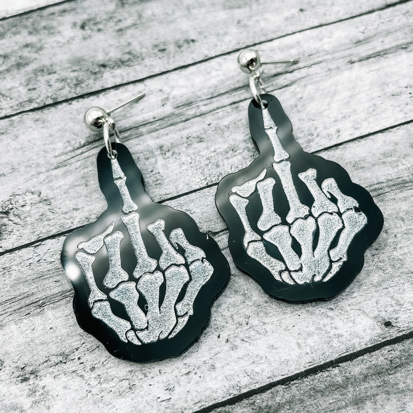 Middle Finger Skeleton Dangles