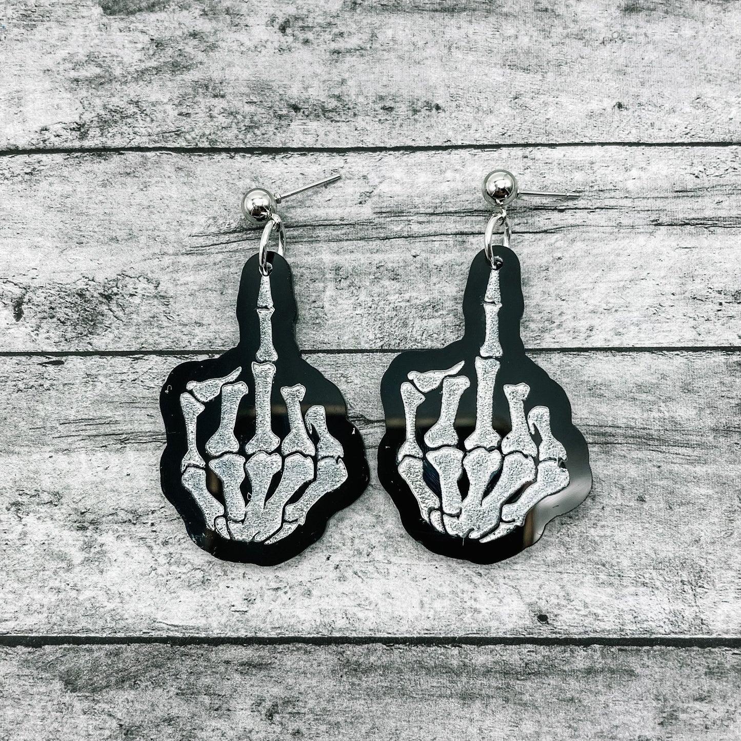 Middle Finger Skeleton Dangles